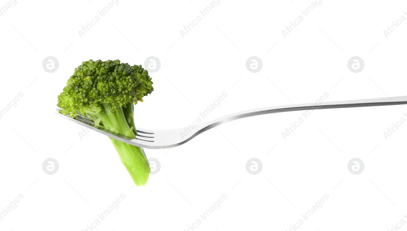 Photo of Fork with tasty broccoli isolated on white