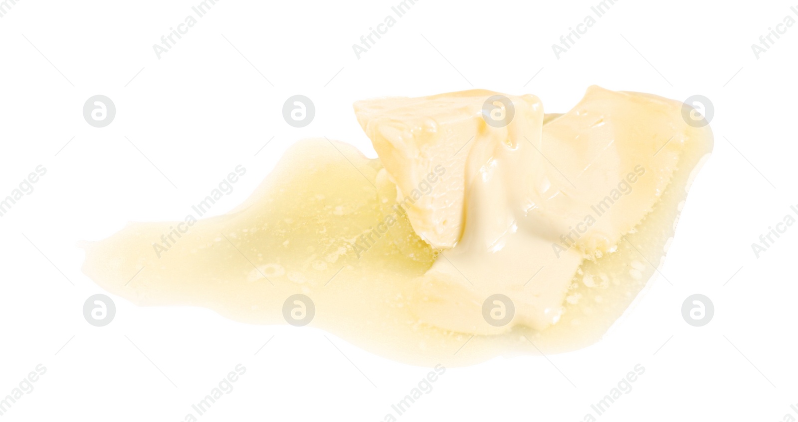 Photo of Piece of melting butter on white background