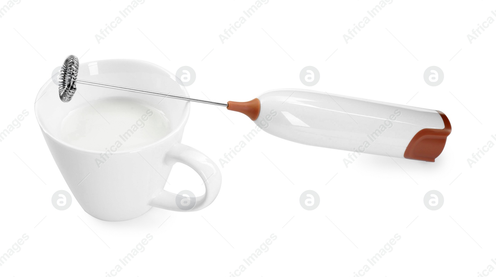 Photo of Milk frother wand and cup isolated on white