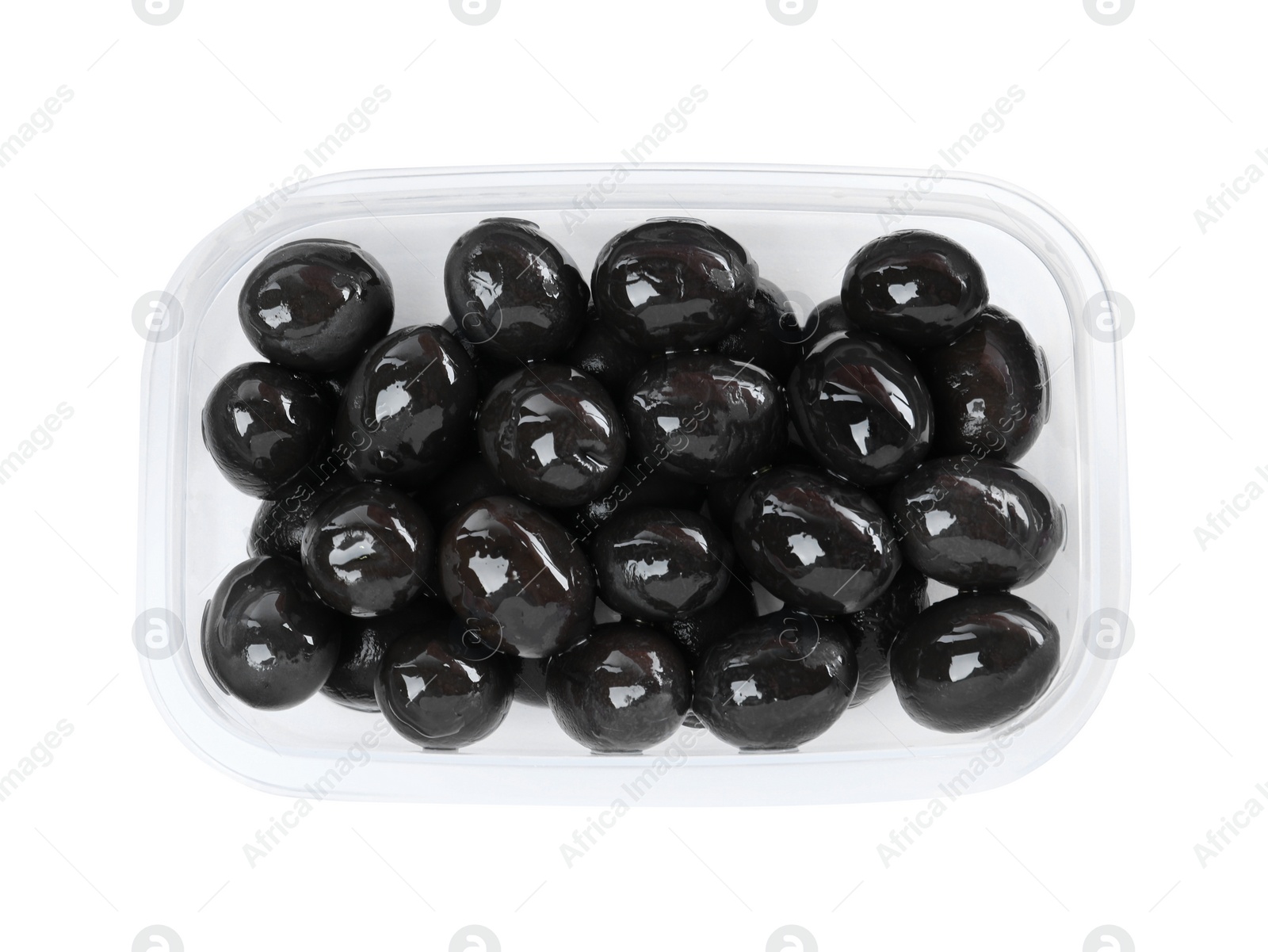 Photo of Fresh black olives in plastic container isolated on white, top view