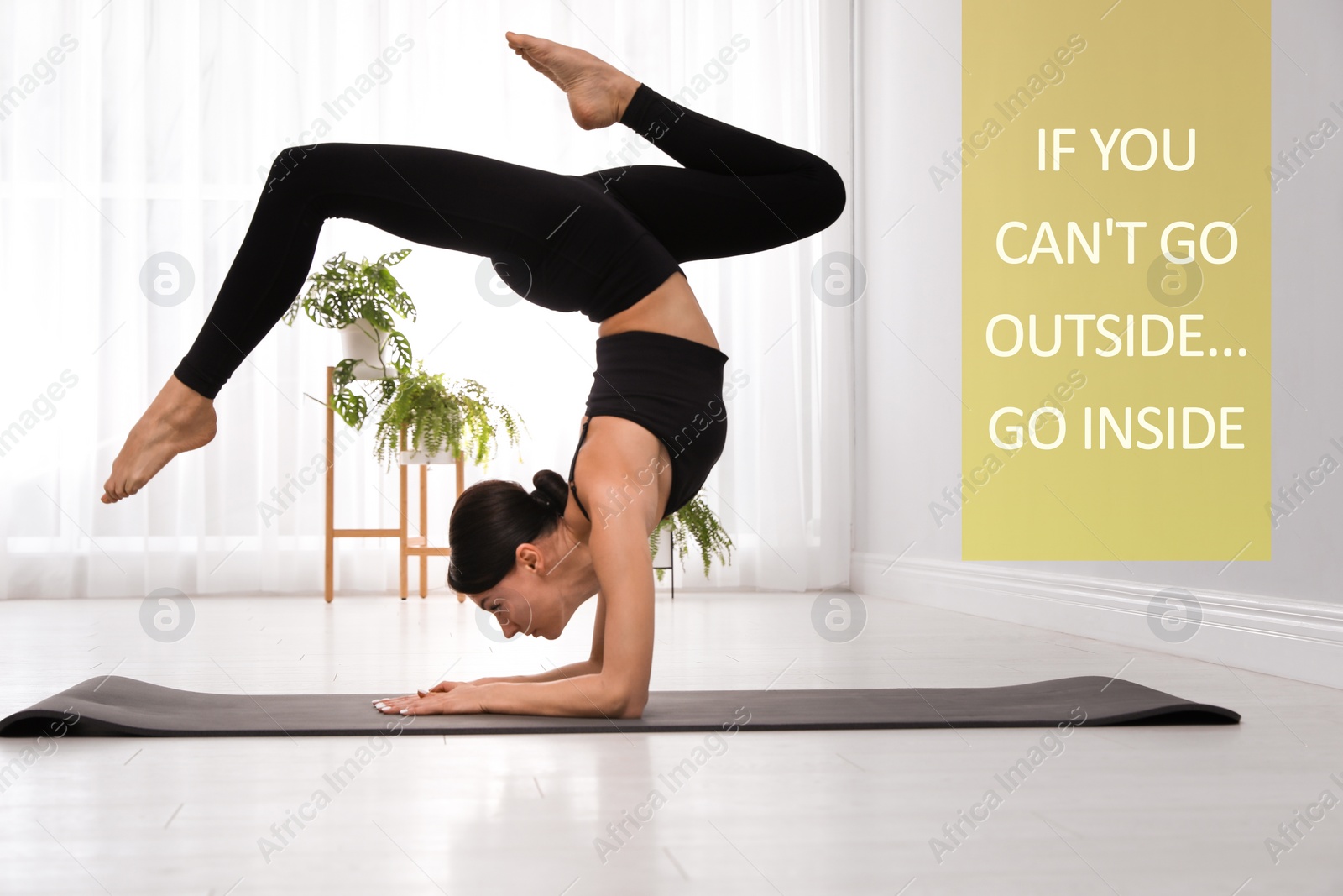 Image of Young woman in sportswear practicing yoga at home