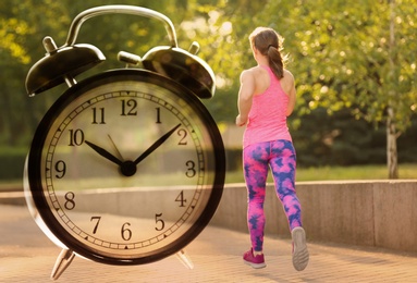 Time to do morning exercises. Double exposure of woman running in park and alarm clock