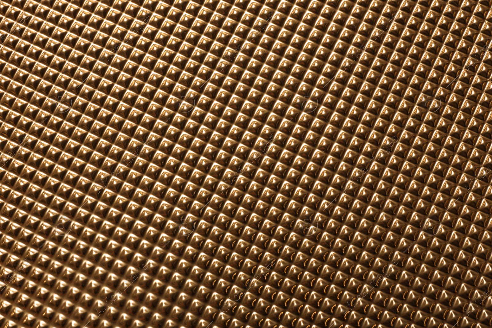 Photo of Textured golden surface as background, top view