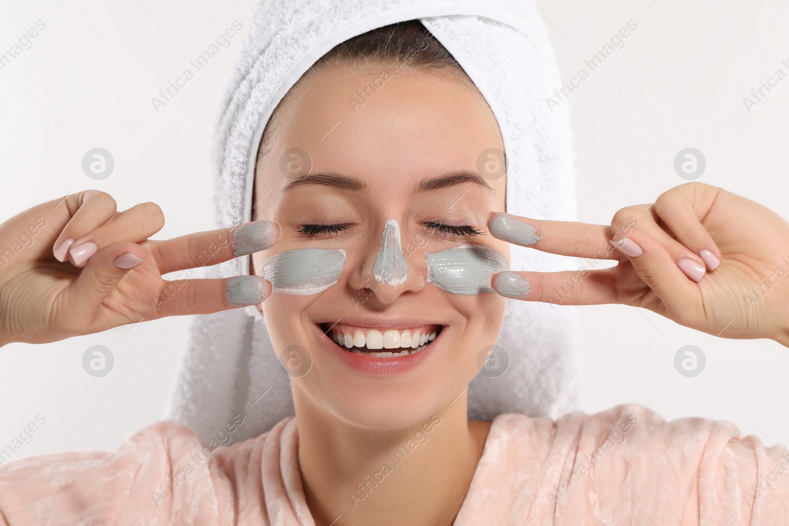 Photo of Woman with face mask on white background. Spa treatments