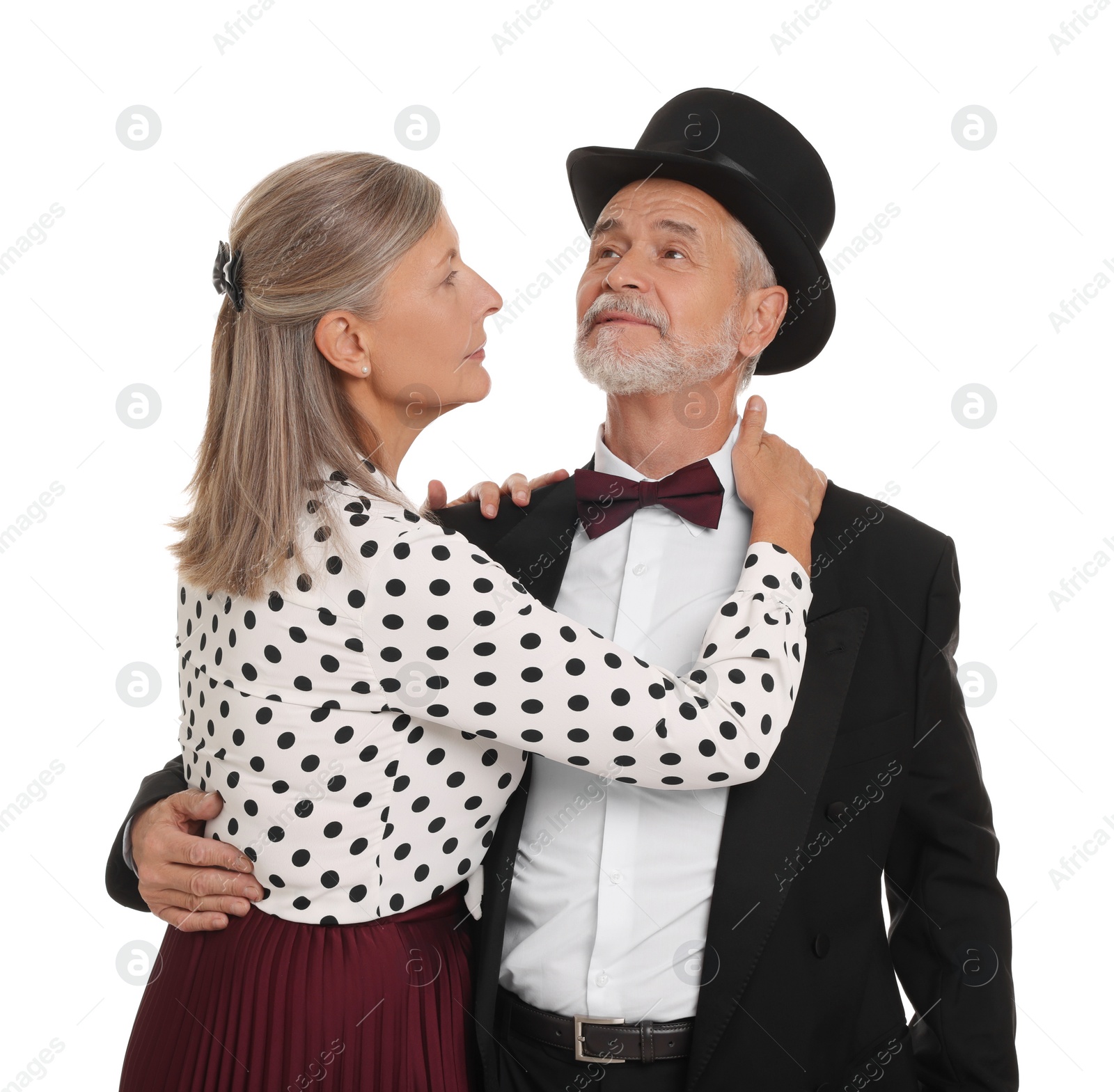 Photo of Senior couple dancing together on white background