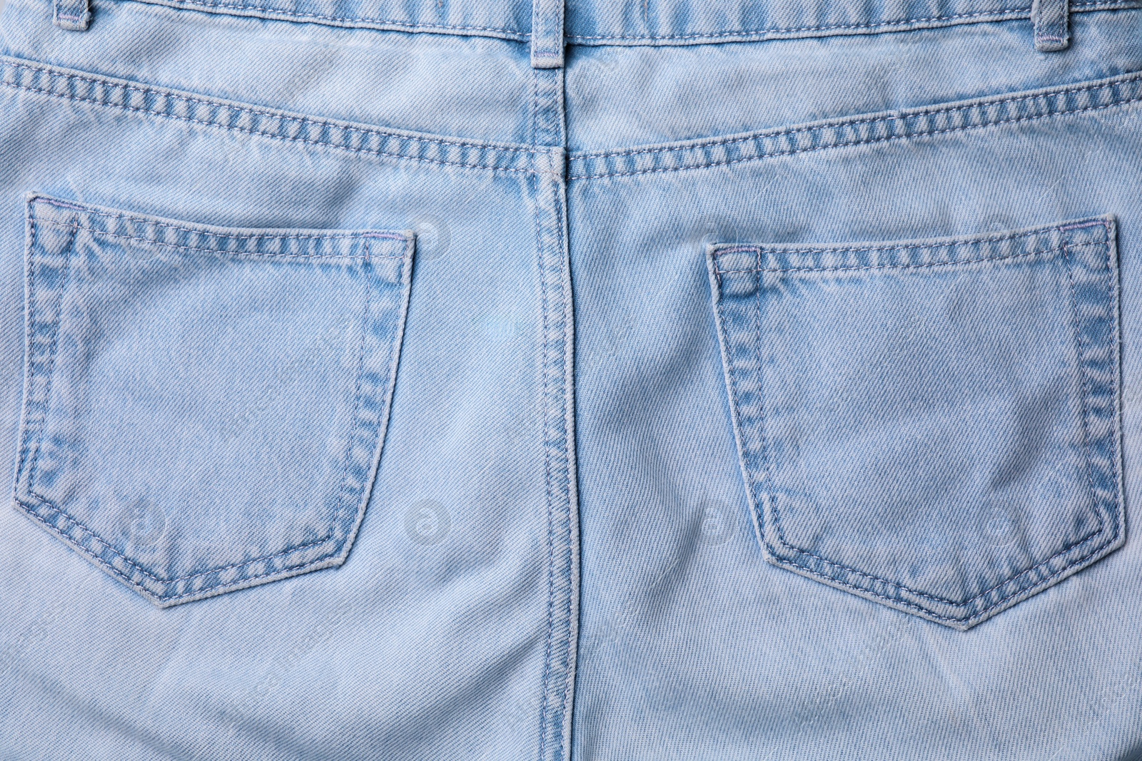 Photo of Jeans with pockets as background, top view
