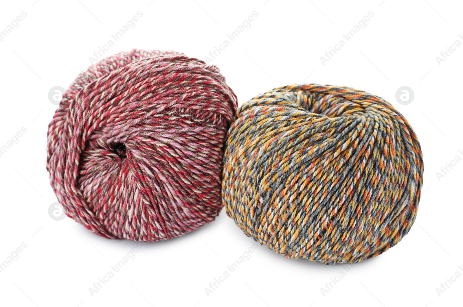 Photo of Soft colorful woolen yarns on white background