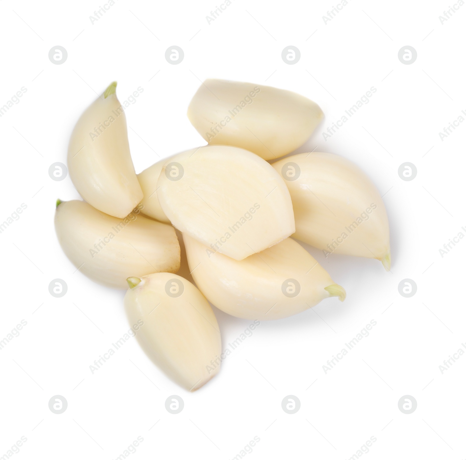 Photo of Peeled cloves of fresh garlic isolated on white, top view