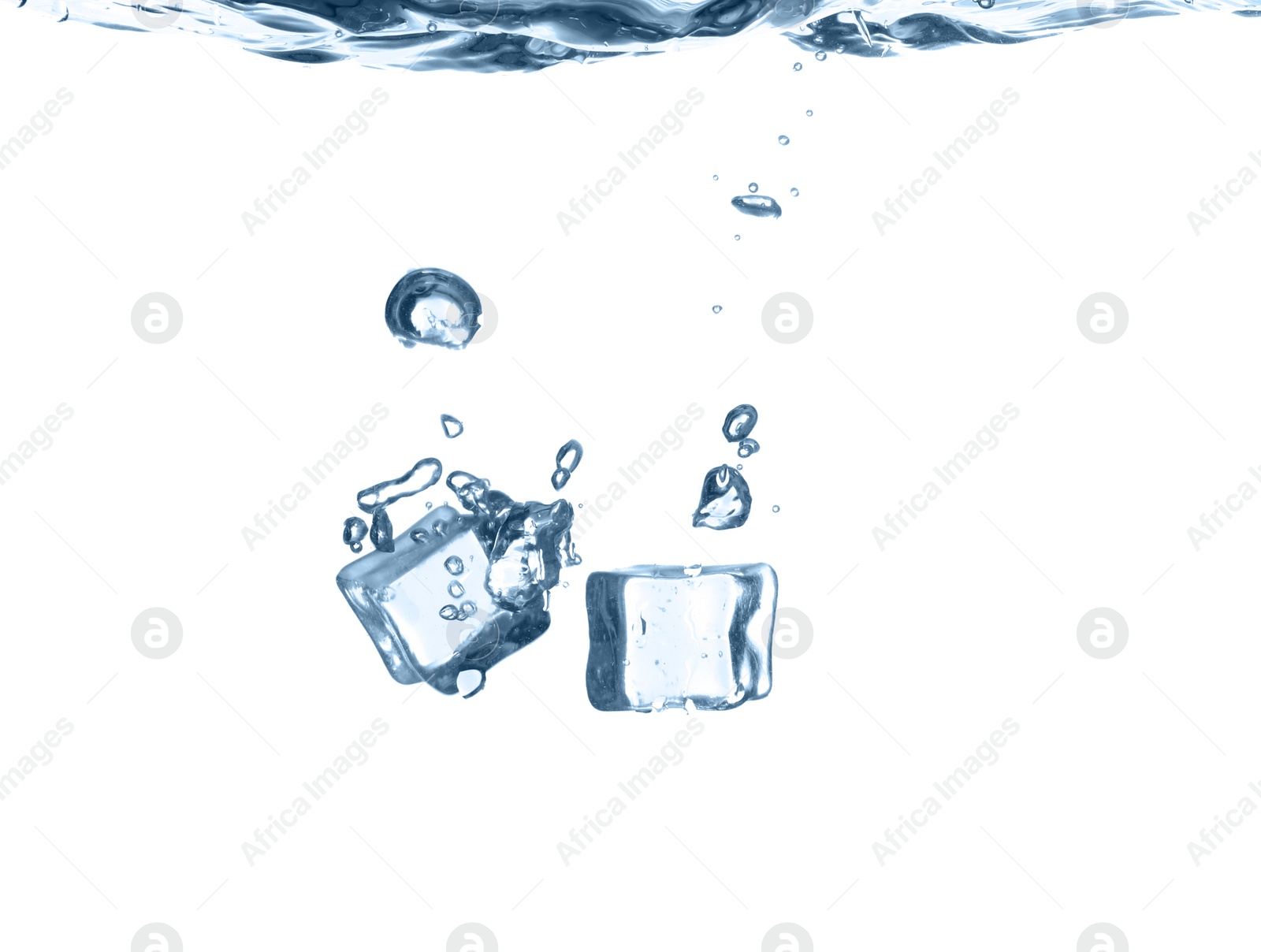 Photo of Ice cubes falling into water against white background