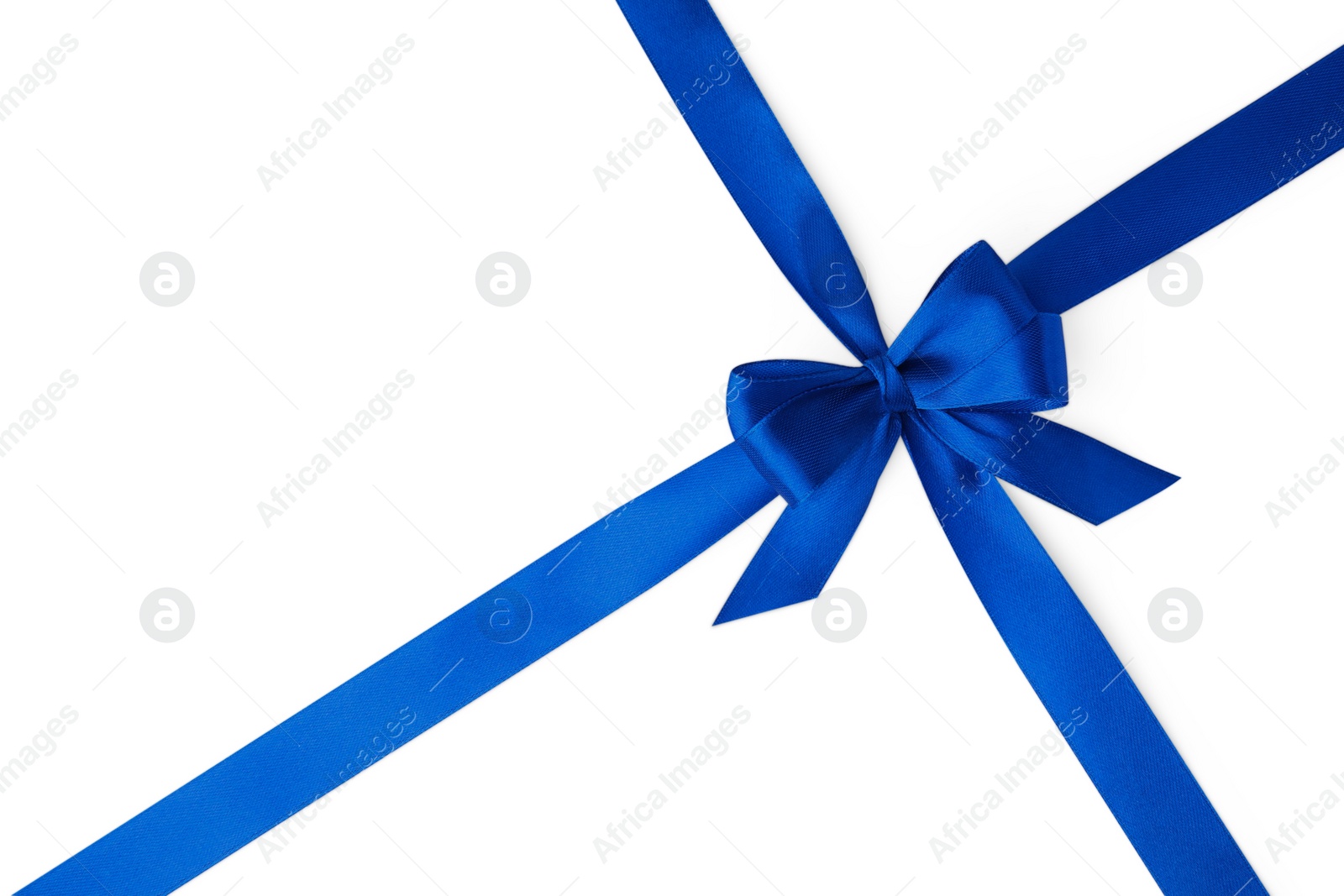 Photo of Blue satin ribbon with bow on white background, top view