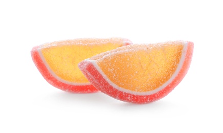 Photo of Bright delicious jelly candies on white background