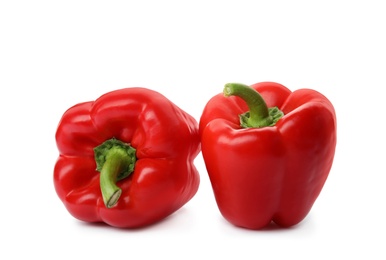 Photo of Raw ripe paprika peppers on white background