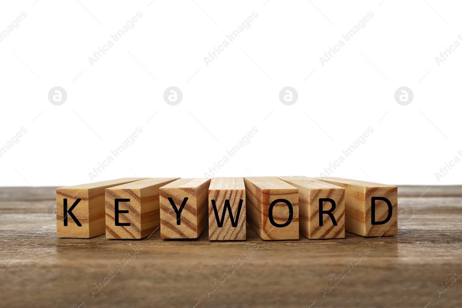 Photo of Word KEYWORD made of blocks on wooden table