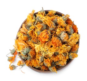 Dry calendula flowers in wooden bowl on white background, top view