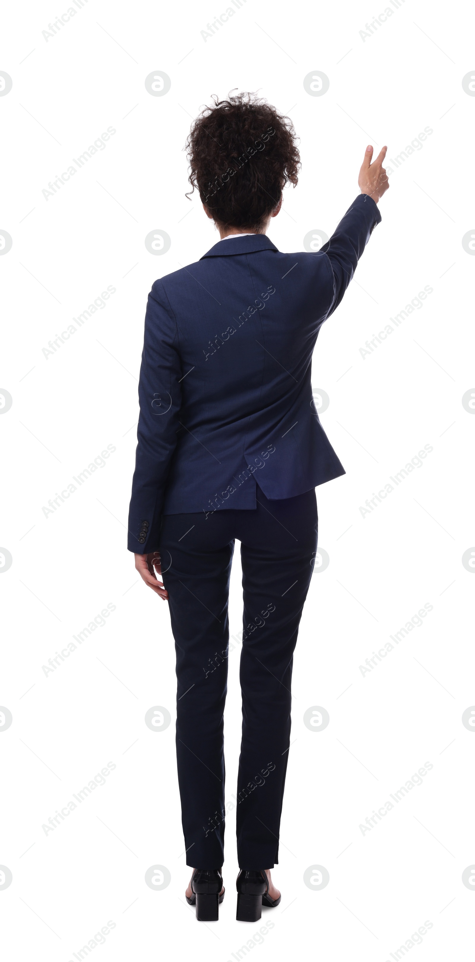 Photo of Businesswoman in suit pointing at something on white background, back view