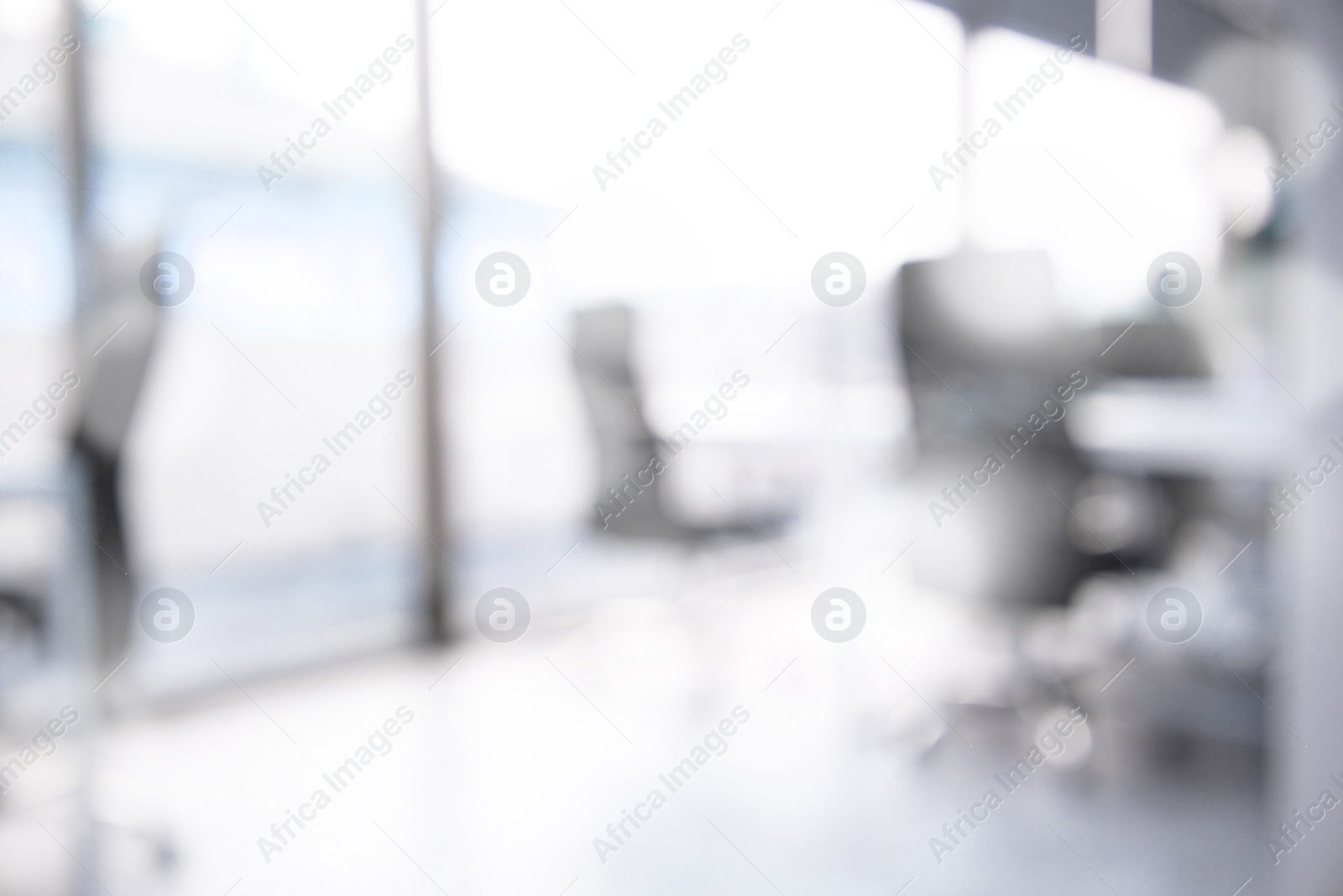 Image of Office interior. Blurred view of comfortable workspace