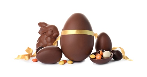 Photo of Composition with chocolate Easter eggs on white background