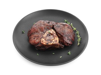 Photo of Delicious grilled beef meat with thyme isolated on white
