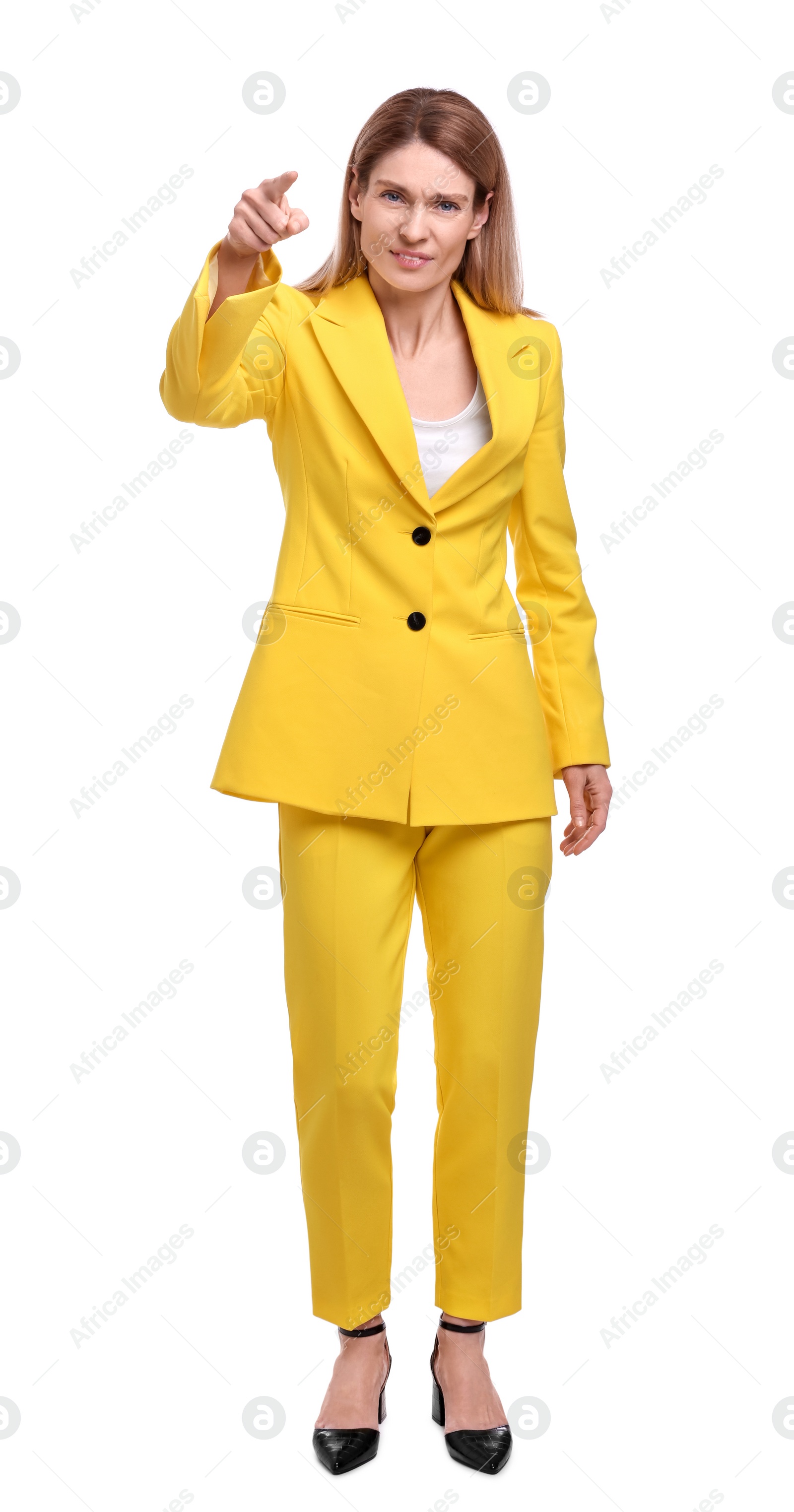 Photo of Beautiful business woman pointing at something on white background