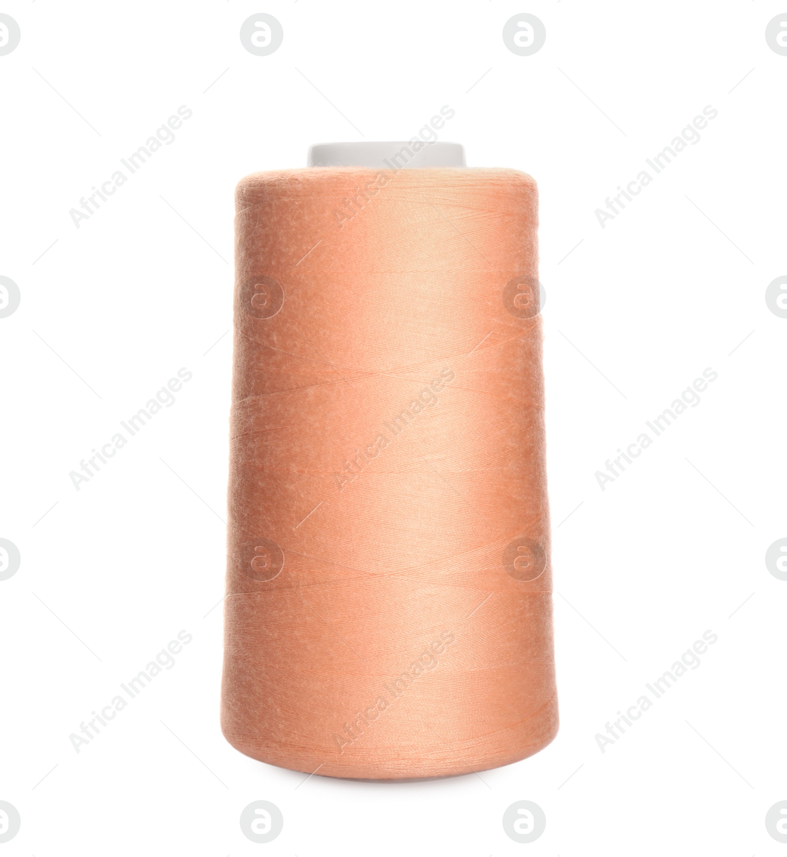 Photo of Spool of pale pink sewing thread isolated on white