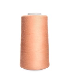 Spool of pale pink sewing thread isolated on white