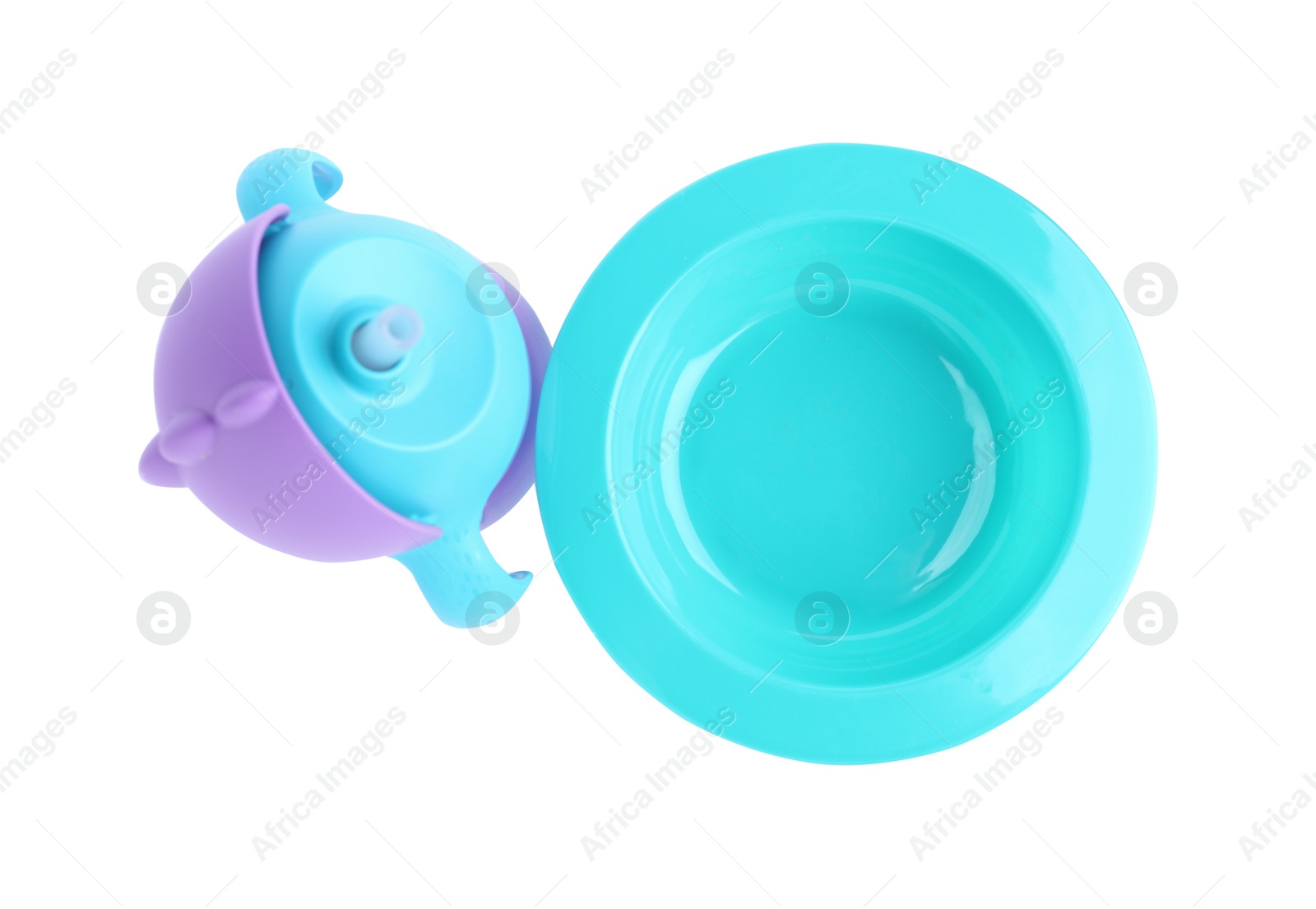 Photo of Set of plastic dishware isolated on white, top view. Serving baby food