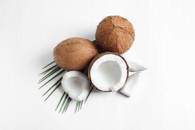 Photo of Ripe coconuts on white background