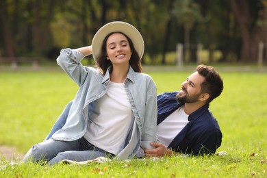 Beautiful couple spending time together in park