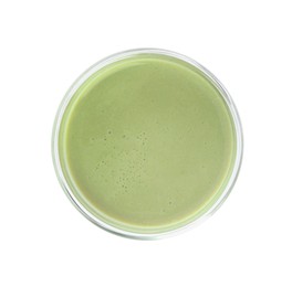 Glass of tasty matcha smoothie isolated on white, top view