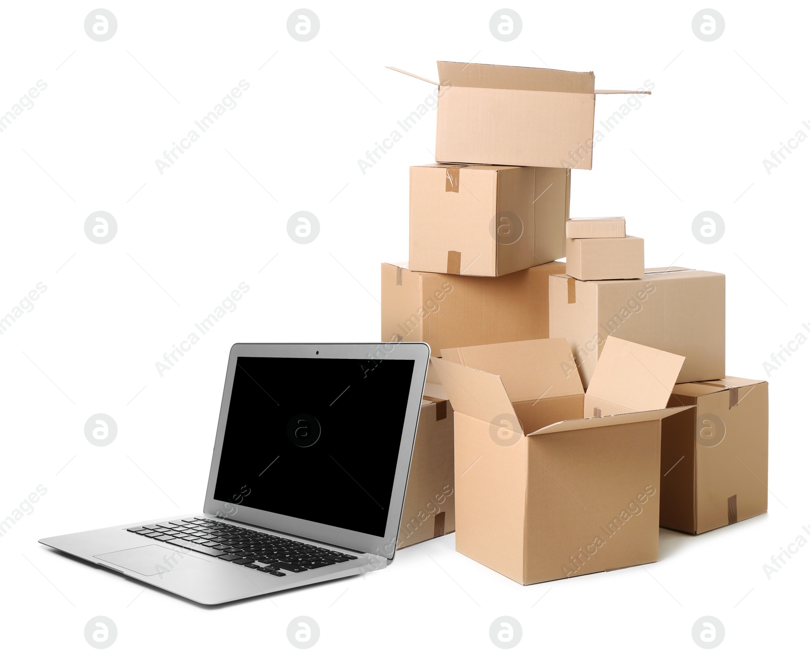 Image of Online selling. Laptop and parcels on white background