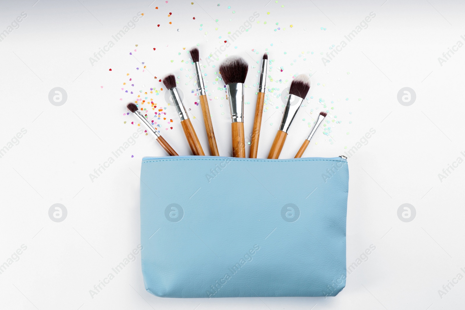 Photo of Flat lay composition with makeup brushes on white background