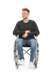Handsome young man in wheelchair isolated on white