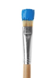 Photo of Brush with blue paint on white background