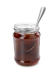 Photo of Jar of tasty sweet fig jam and spoon isolated on white