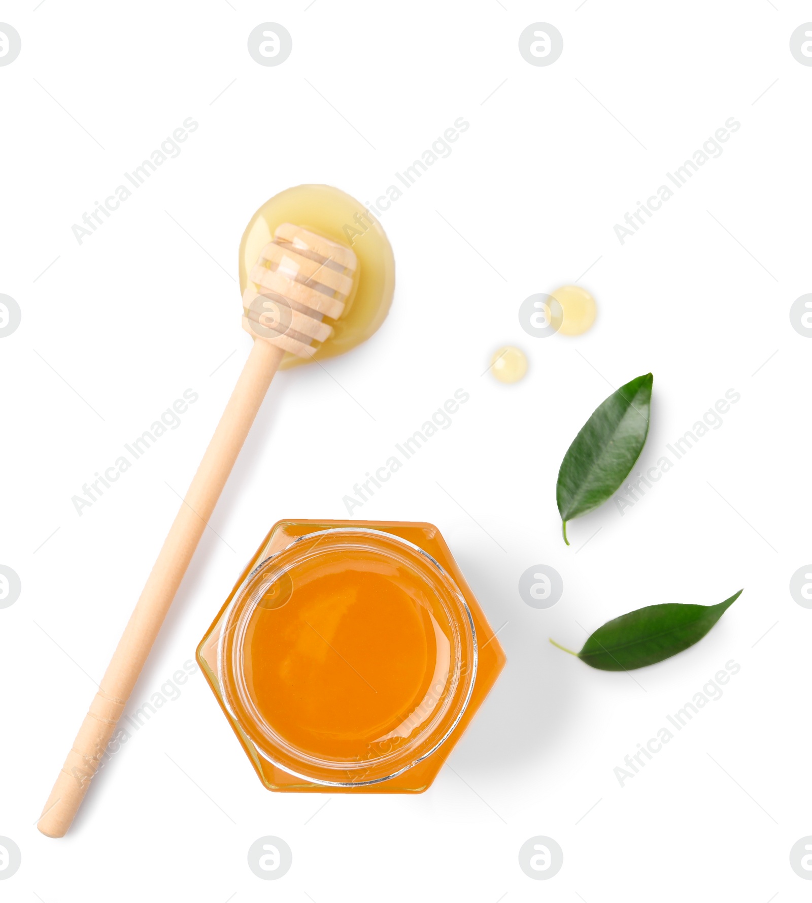 Photo of Tasty honey in glass jar, dipper and leaves isolated on white, top view. Space for text