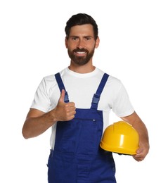 Professional builder in uniform with hard hat isolated on white