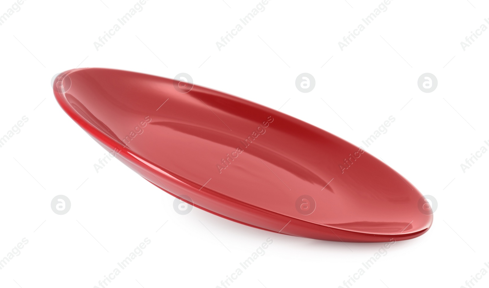 Photo of One beautiful red plate isolated on white