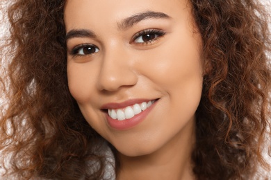 Photo of Portrait of young African-American woman with beautiful face, closeup