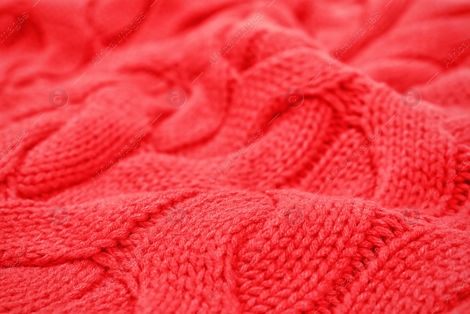 Photo of Texture of cozy warm sweater as background, closeup