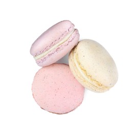 Photo of Different delicious colorful macarons on white background, top view