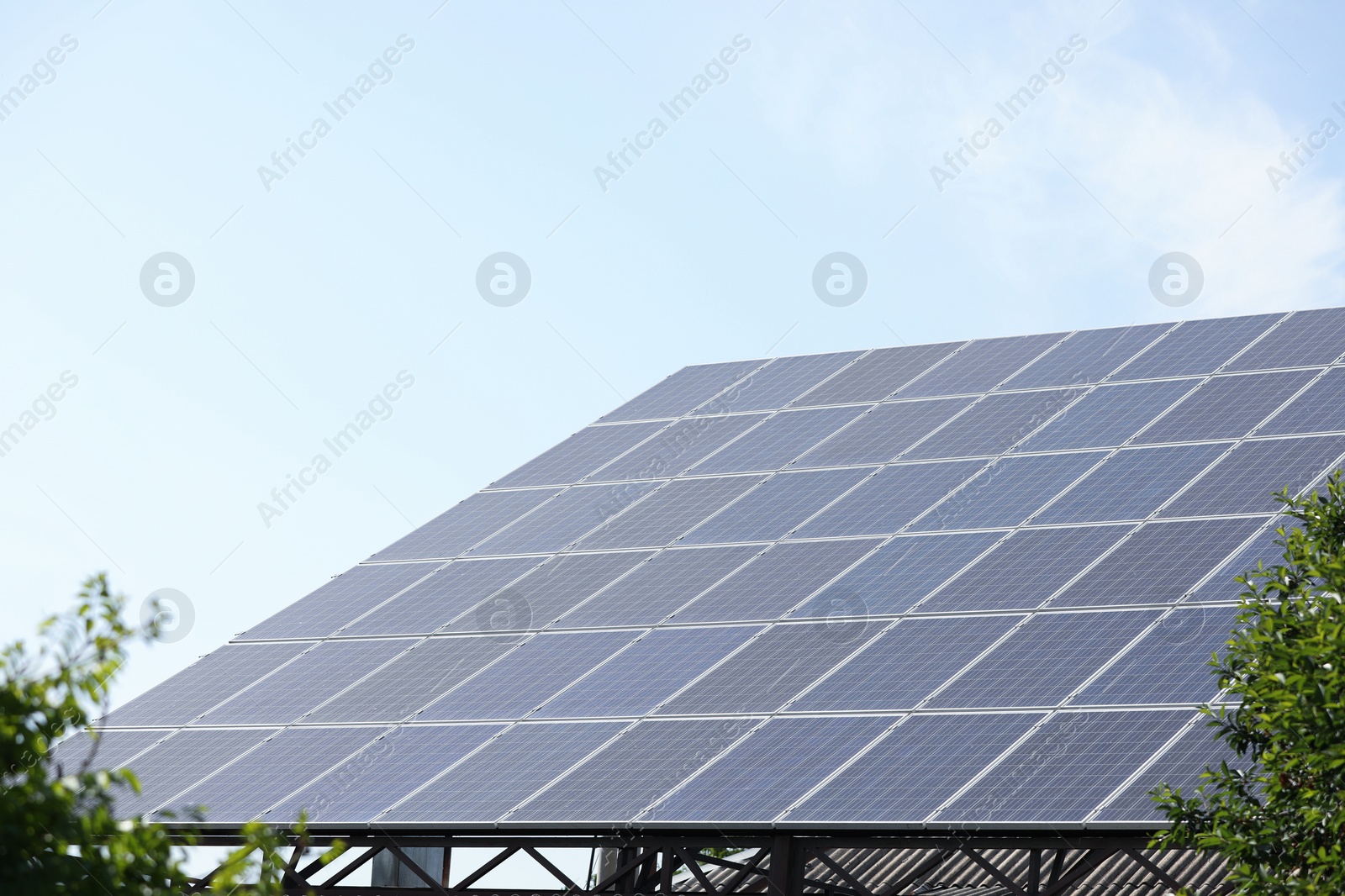 Photo of Modern solar panels outdoors on sunny day