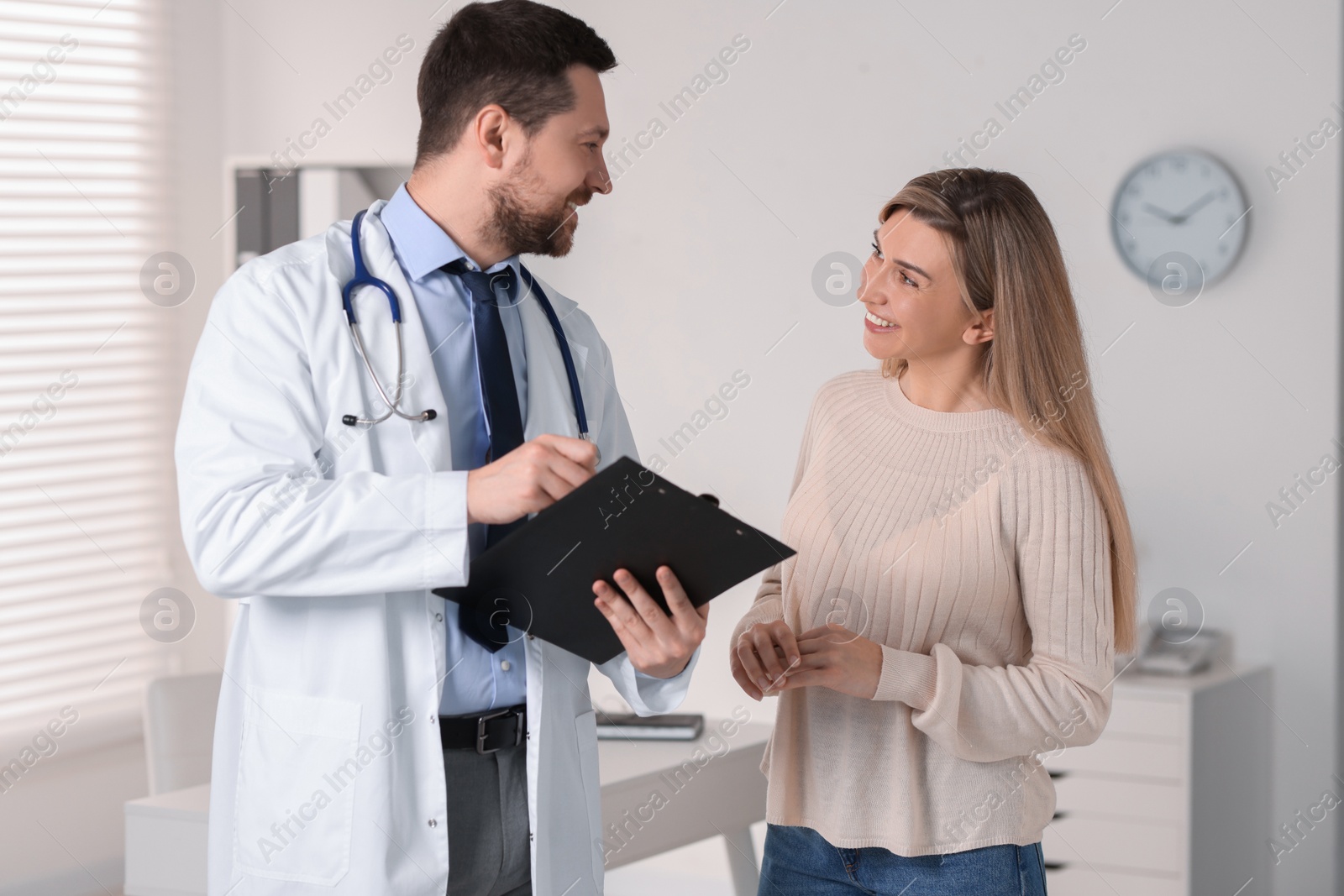 Photo of Professional doctor working with patient in hospital