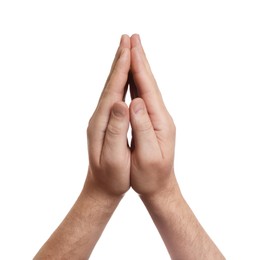 Photo of Man holding hands clasped while praying on white background, closeup