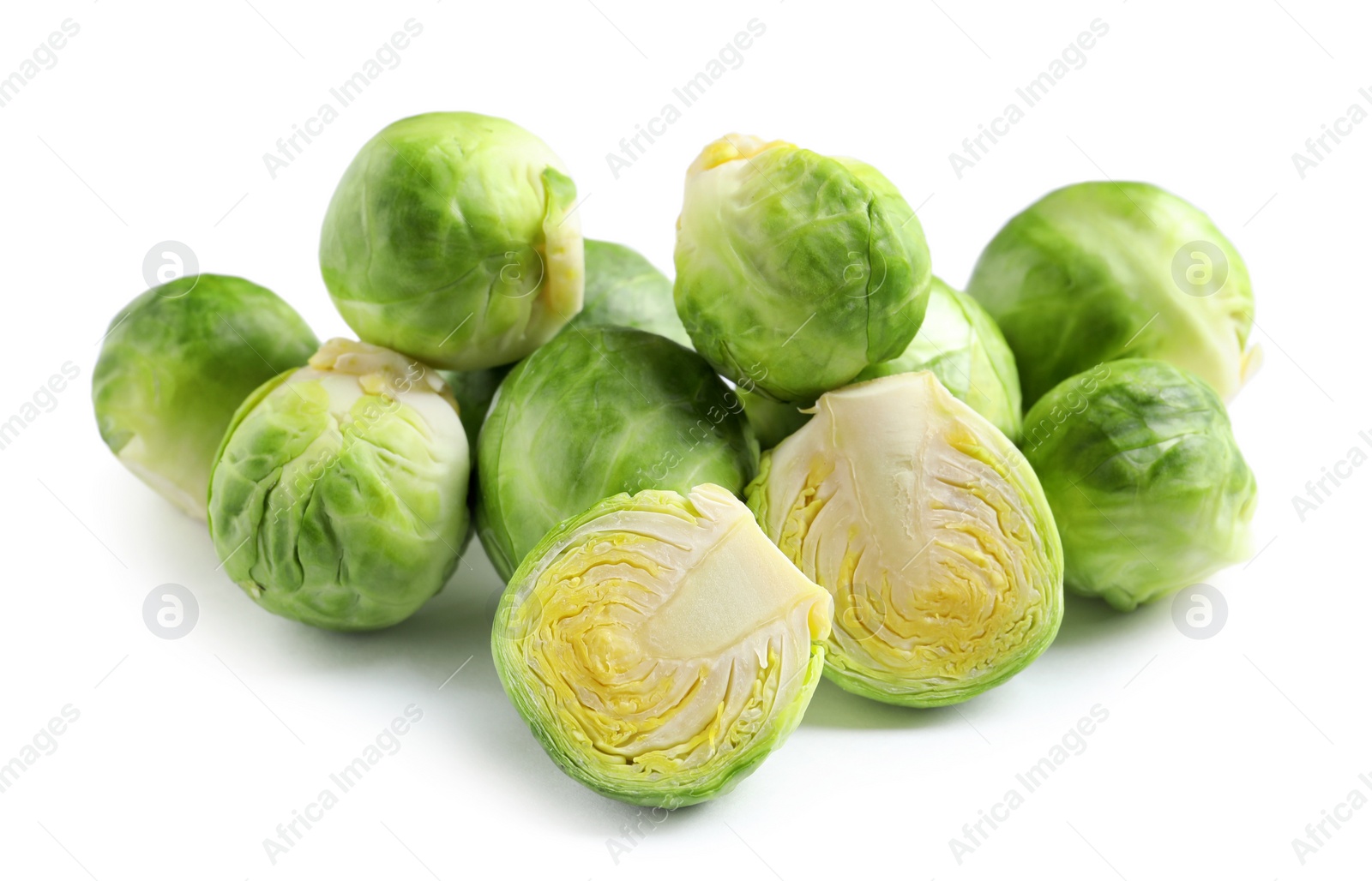 Photo of Pile of fresh Brussels sprouts on white background