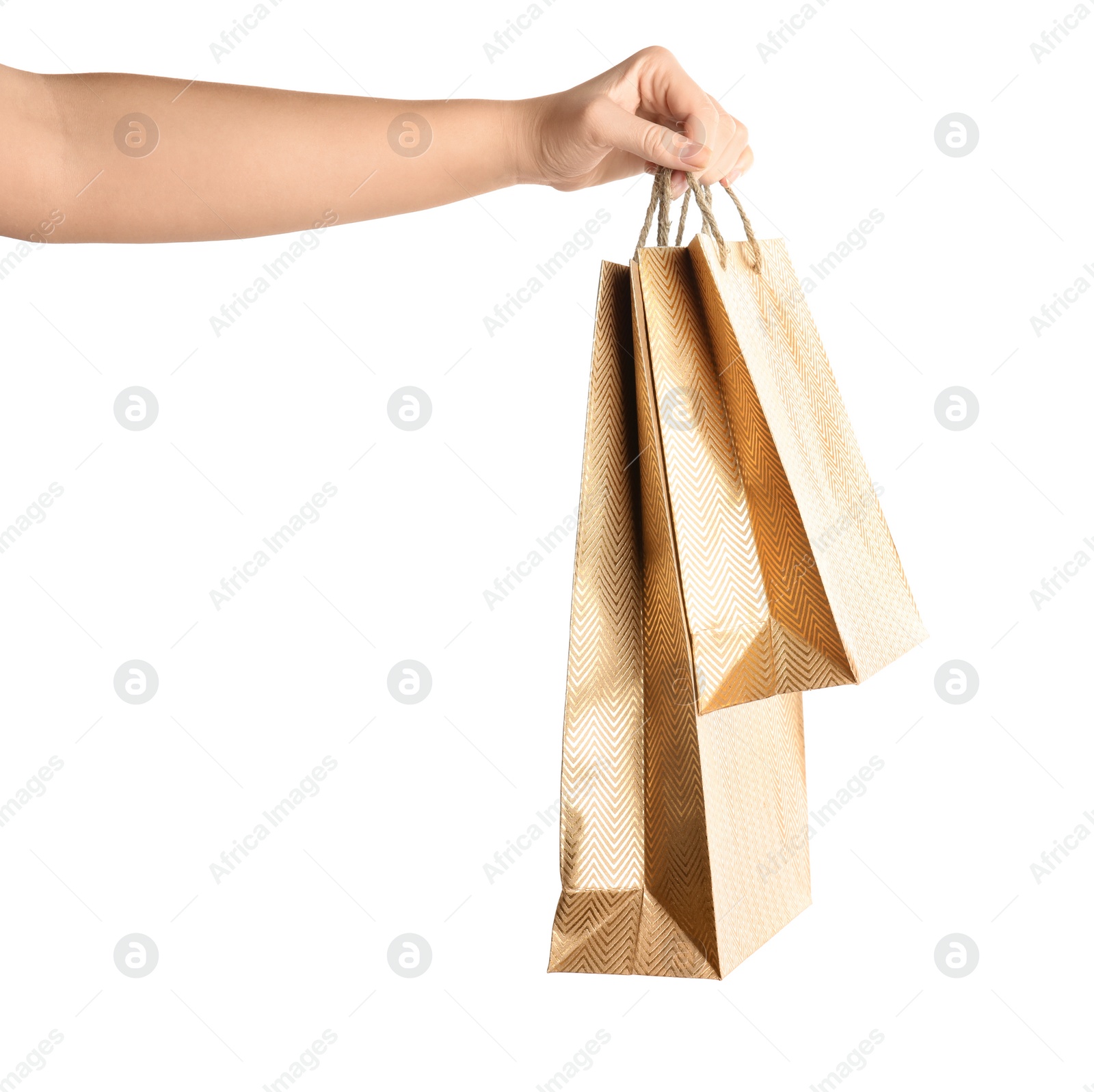 Photo of Woman holding paper shopping bags on white background, closeup