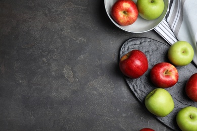 Photo of Fresh ripe green apples on black table, flat lay. Space for text