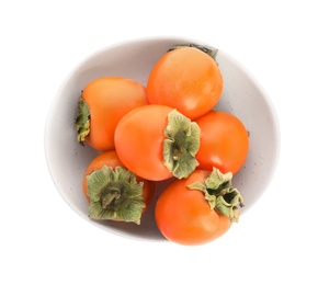 Photo of Bowl with delicious persimmons isolated on white, top view