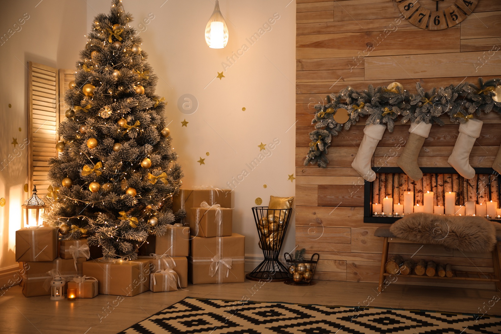 Photo of Stylish room interior with beautiful Christmas tree and decorative fireplace