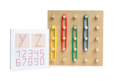 Photo of Wooden geoboard with colorful rubber bands and instruction isolated on white. Educational toy for motor skills development