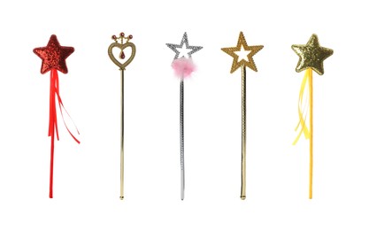 Image of Set with different beautiful magic wands on white background